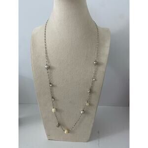 long chain necklace with peace sign charms